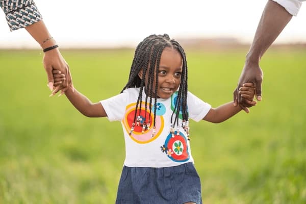 Parenting & More founder with children in Montessori environment